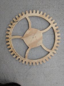 Wooden gear for a sign